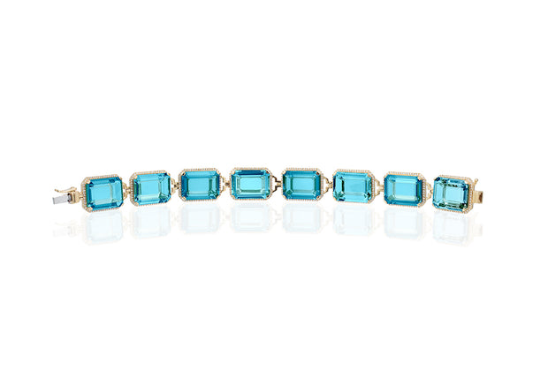 Blue Topaz Emerald Cut Bracelet with Diamonds