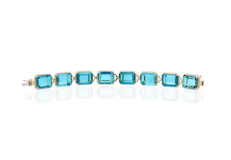 Blue Topaz Emerald Cut Bracelet with Diamonds