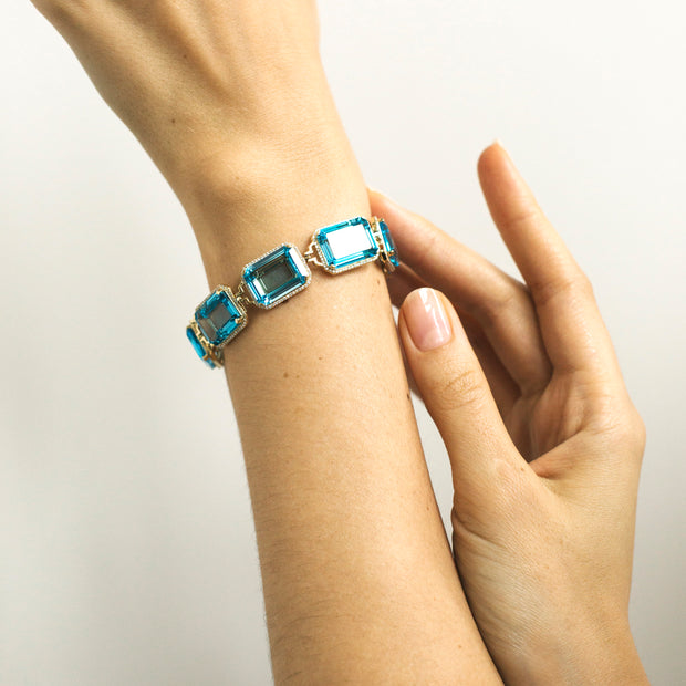 Blue Topaz Emerald Cut Bracelet with Diamonds