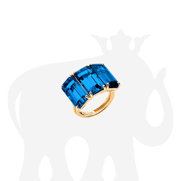 Three Stone Emerald Cut London Blue Topaz Ring