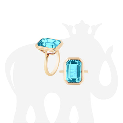 Blue Topaz Emerald Cut Bezel Set Ring