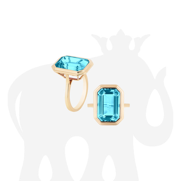 Blue Topaz Emerald Cut Bezel Set Ring