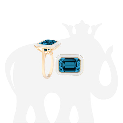 East-West London Blue Topaz Emerald Cut Ring with White Enamel